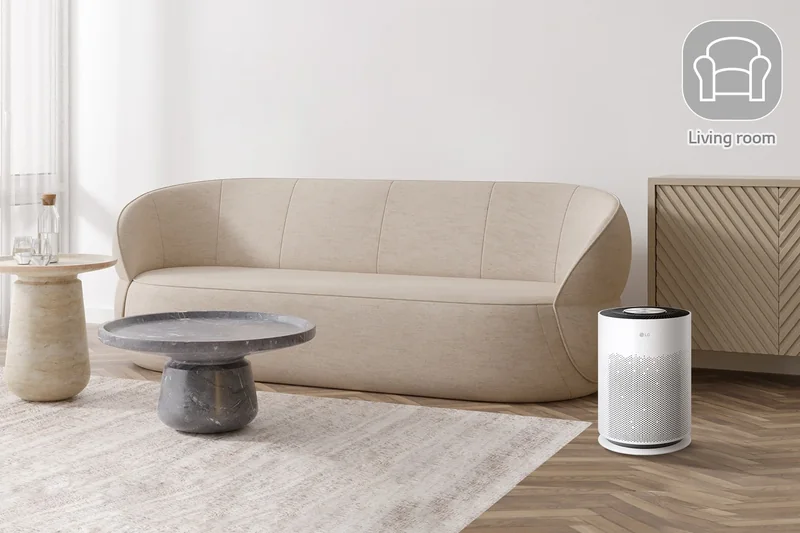 Compact LG PuriCare AS60GHWG0 air purifier in a living room