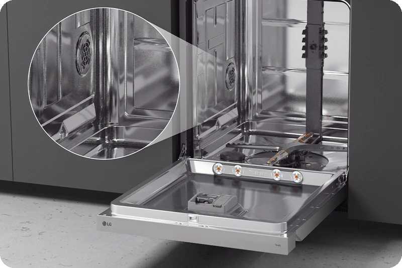 Open LG freestanding dishwasher in the kitchen, showcasing its fully stainless steel interior.