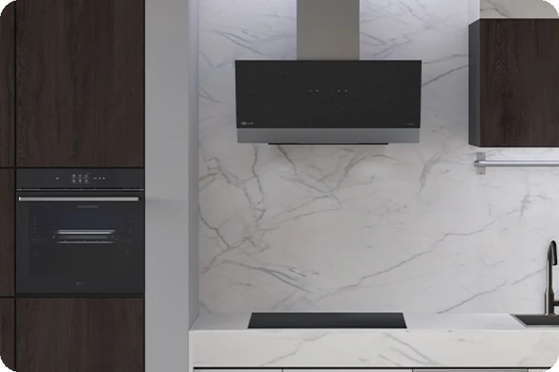 A kitchen with the LG freestanding dishwasher, oven, hood and induction hob installed.