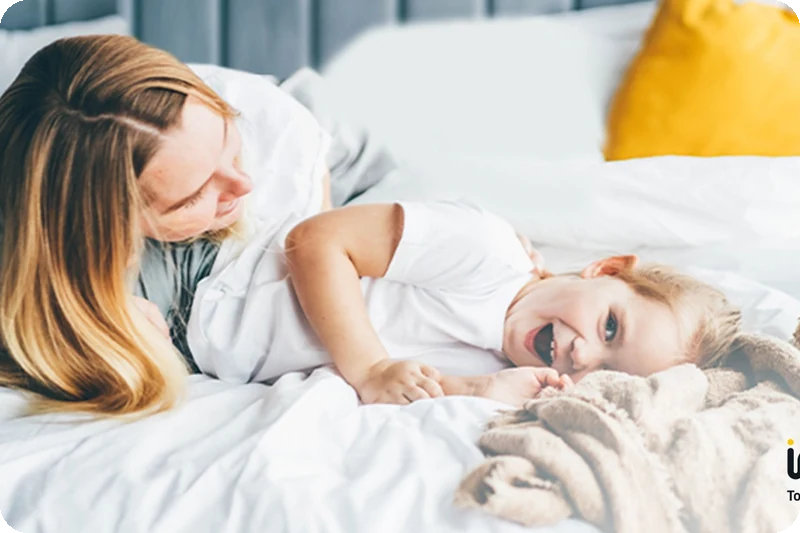 A family resting comfortably after clothes receive LG Steam Allergy Care.