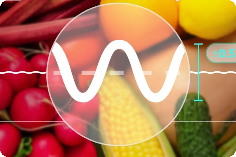 LinearCooling temperature graph in front of fresh vegetables.