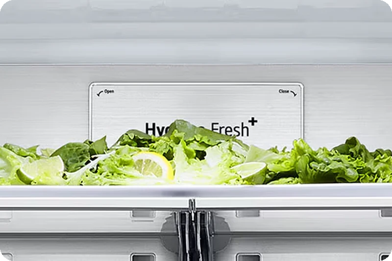 Close-up of the Metal Fresh label and metallic refrigerator interior