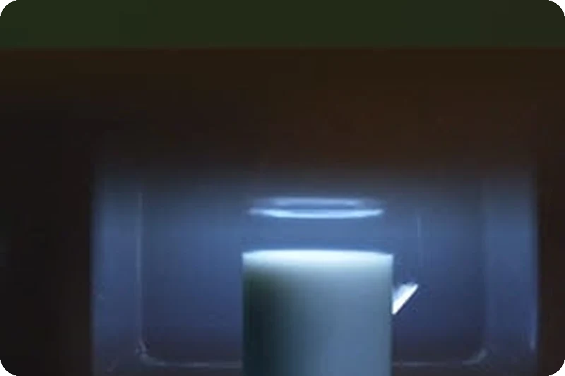 The LG NeoChef microwave interior illuminated by its LED lamp.