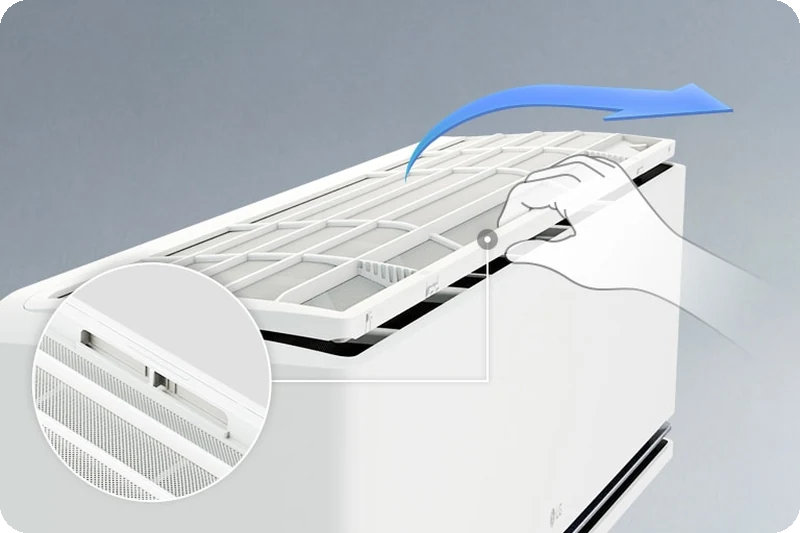 LG air conditioner top filter detaching with the push-button hook highlighted.
