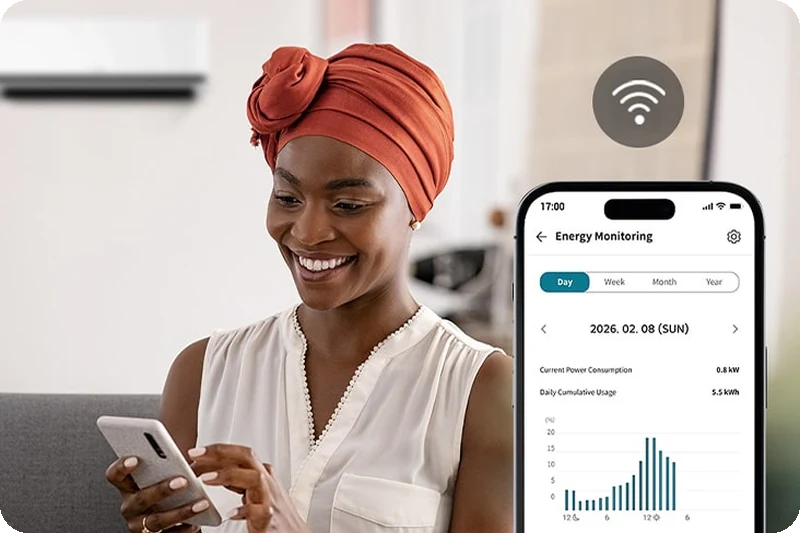 Woman using LG ThinQ to monitor energy use and air conditioner maintenance.