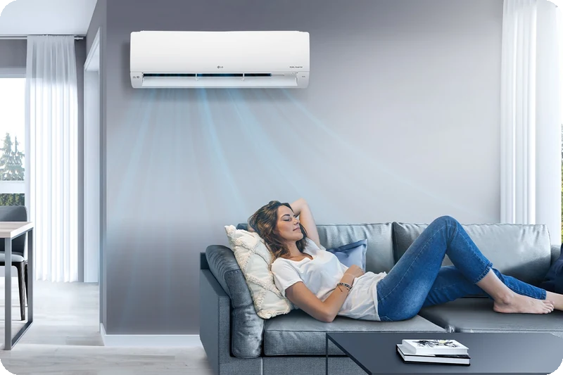 A person sleeping comfortably while the LG air conditioner operates.