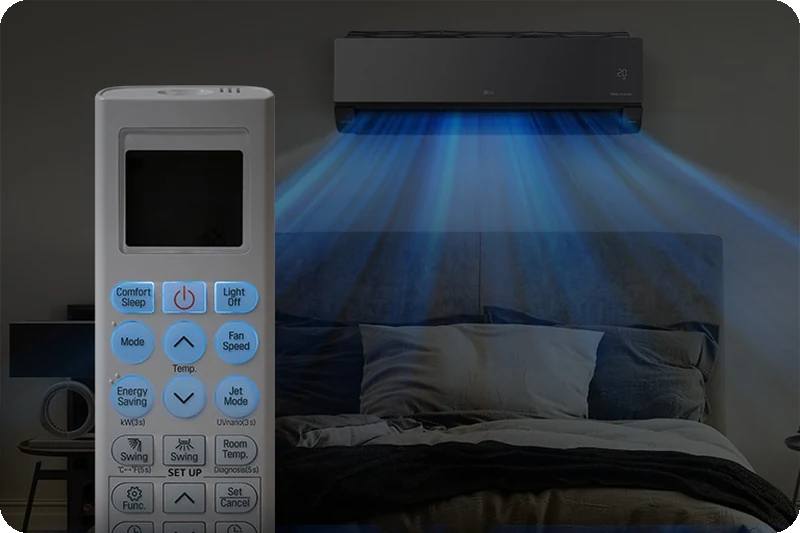 The LG ARTCOOL remote control glowing in a dark bedroom.