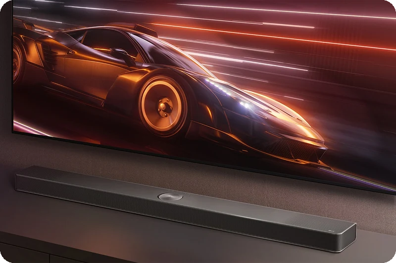 A racing game displayed on an LG television connected through the S90TY Soundbar.