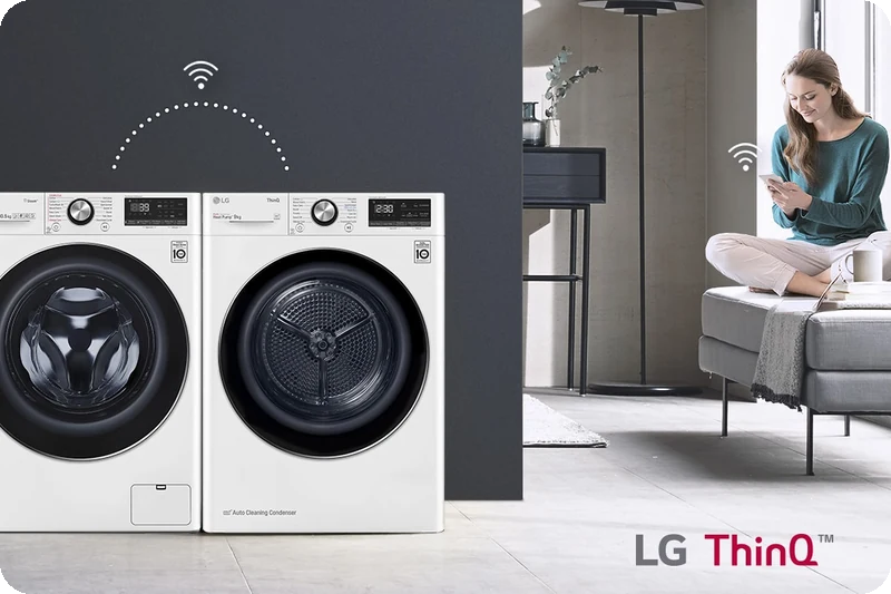 LG washer and dryer connected by Wi-Fi while the user controls them through the ThinQ app.