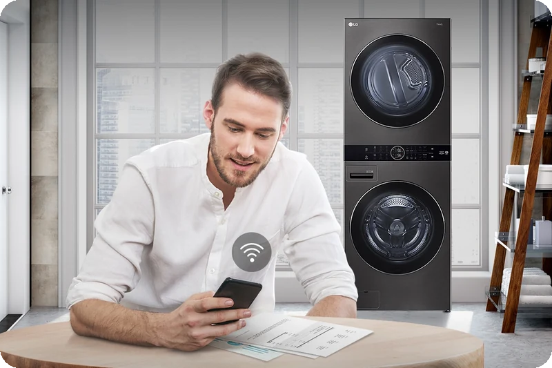 LG ThinQ app displaying WashTower status, cycles and energy information.