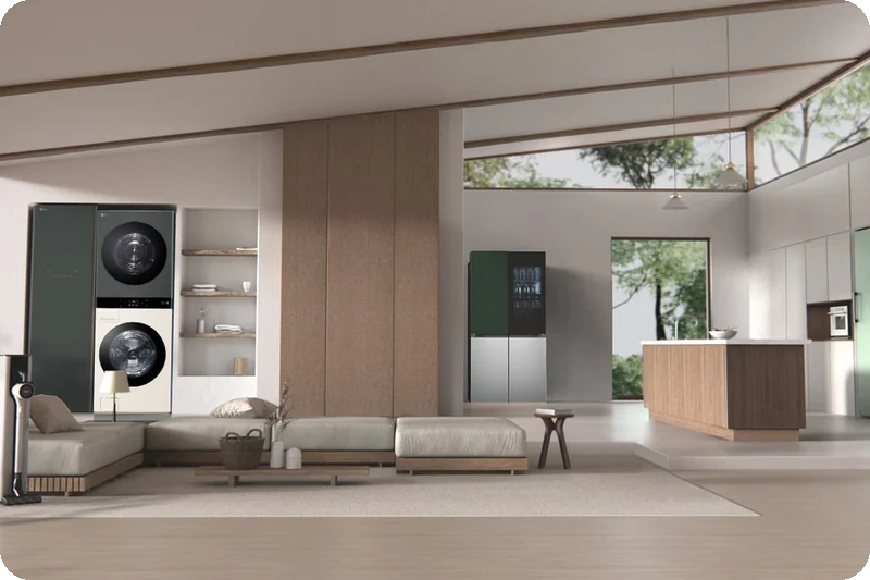 LG Objet WashTower in Nature Green standing in a modern laundry room.