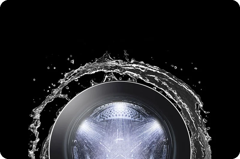 TurboWash 360 water jets spraying laundry inside an LG washer drum.